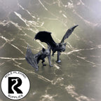 A dnd miniature giant bat primed in black.