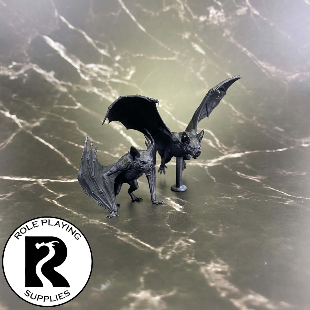 A dnd miniature giant bat primed in black.