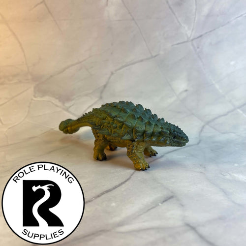 A dnd miniature ankylosaurus painted.
