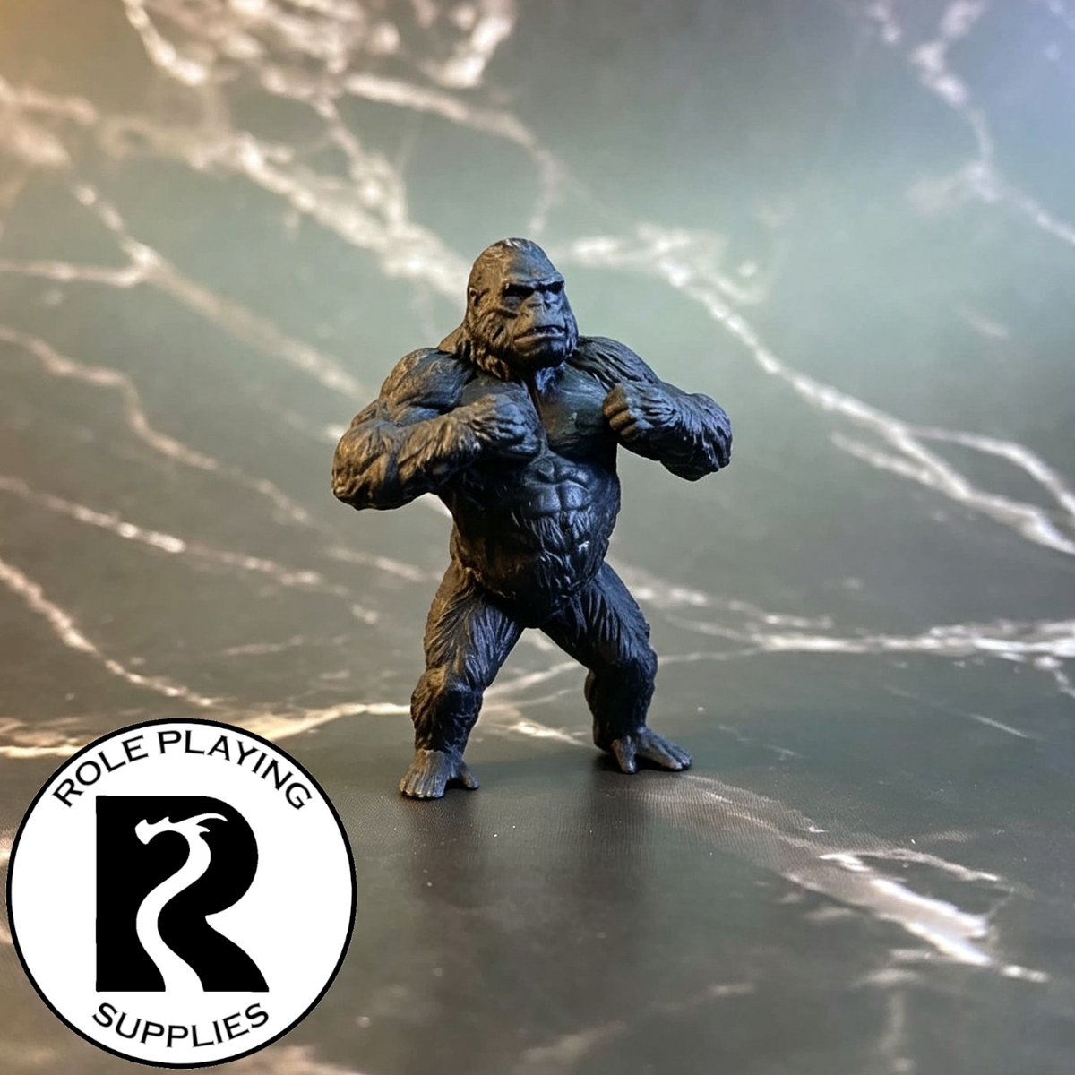 A dnd miniature ape primed in black.

