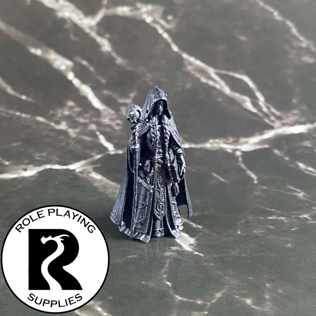 A dnd miniature archmage primed in black.
