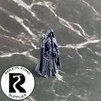 A dnd miniature archmage primed in black.
