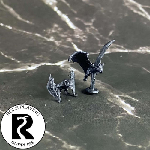 A dnd miniature bat primed in black.
