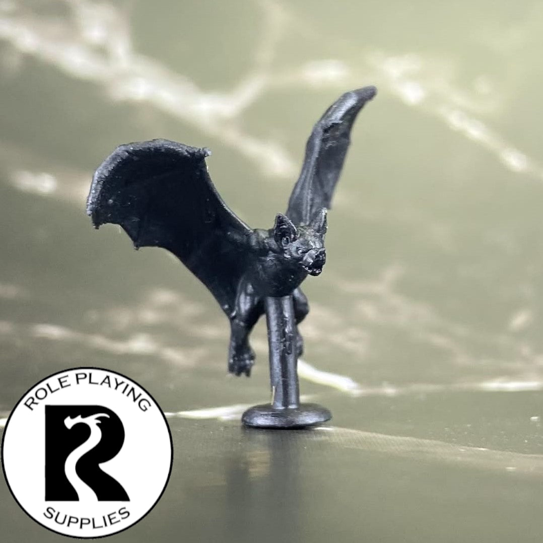 A dnd miniature bat primed in black.
