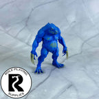 A dnd miniature blue slaad painted.
