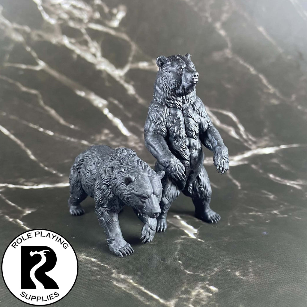 A dnd miniature brown bear primed in black.
