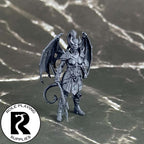 A dnd miniature cambion primed in black.
