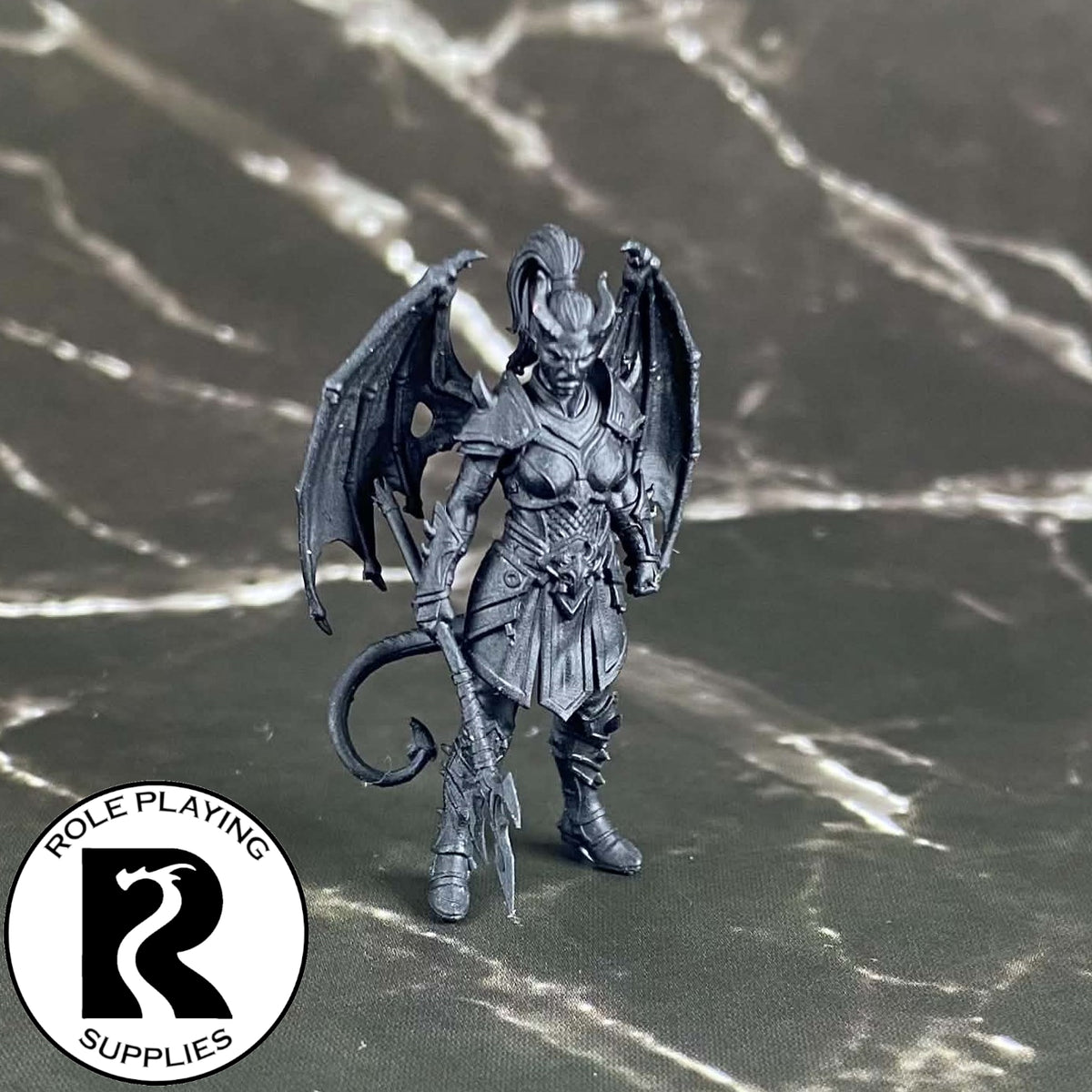 A dnd miniature cambion primed in black.
