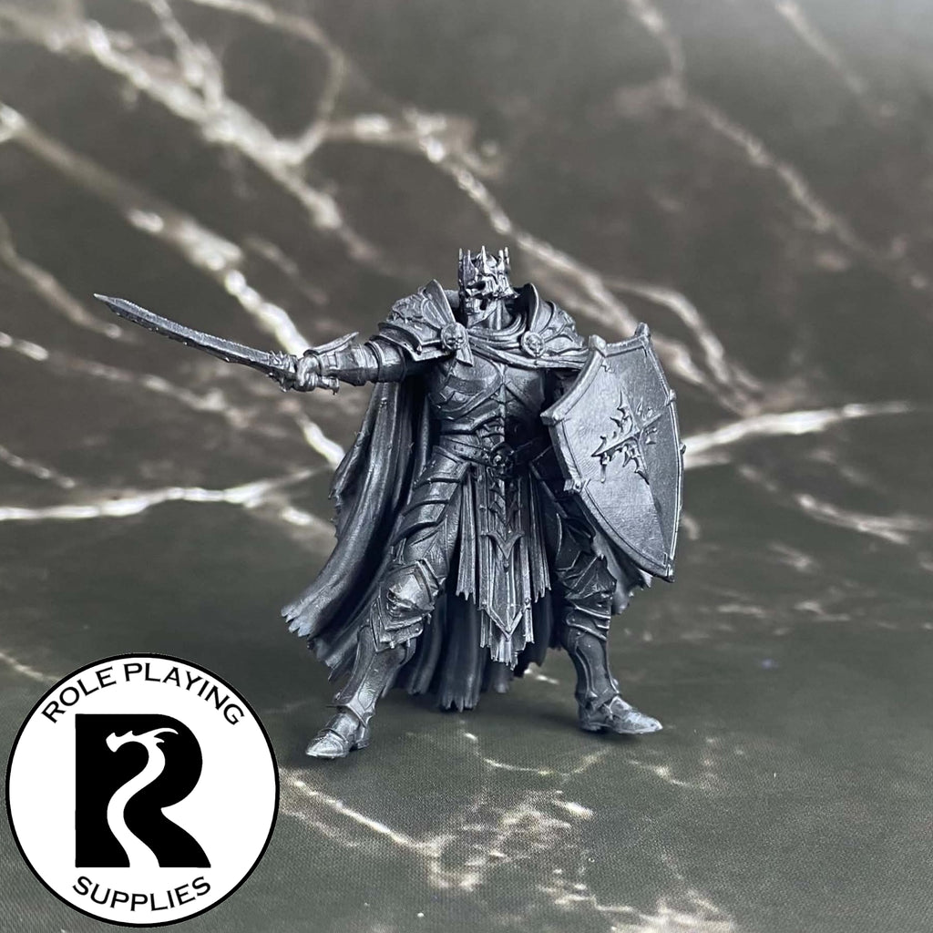 A dnd miniature death knight primed in black.
