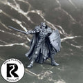 A dnd miniature death knight primed in black.
