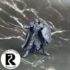 A dnd miniature death knight primed in black.
