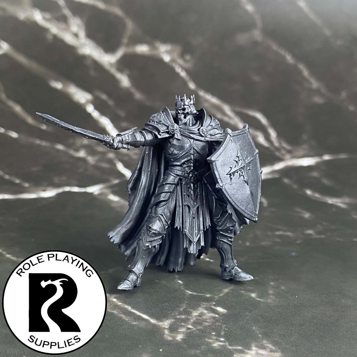 A dnd miniature death knight primed in black.
