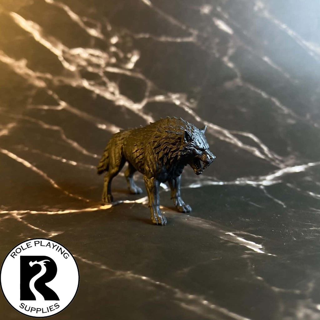 A dnd miniature dire wolf primed in black.