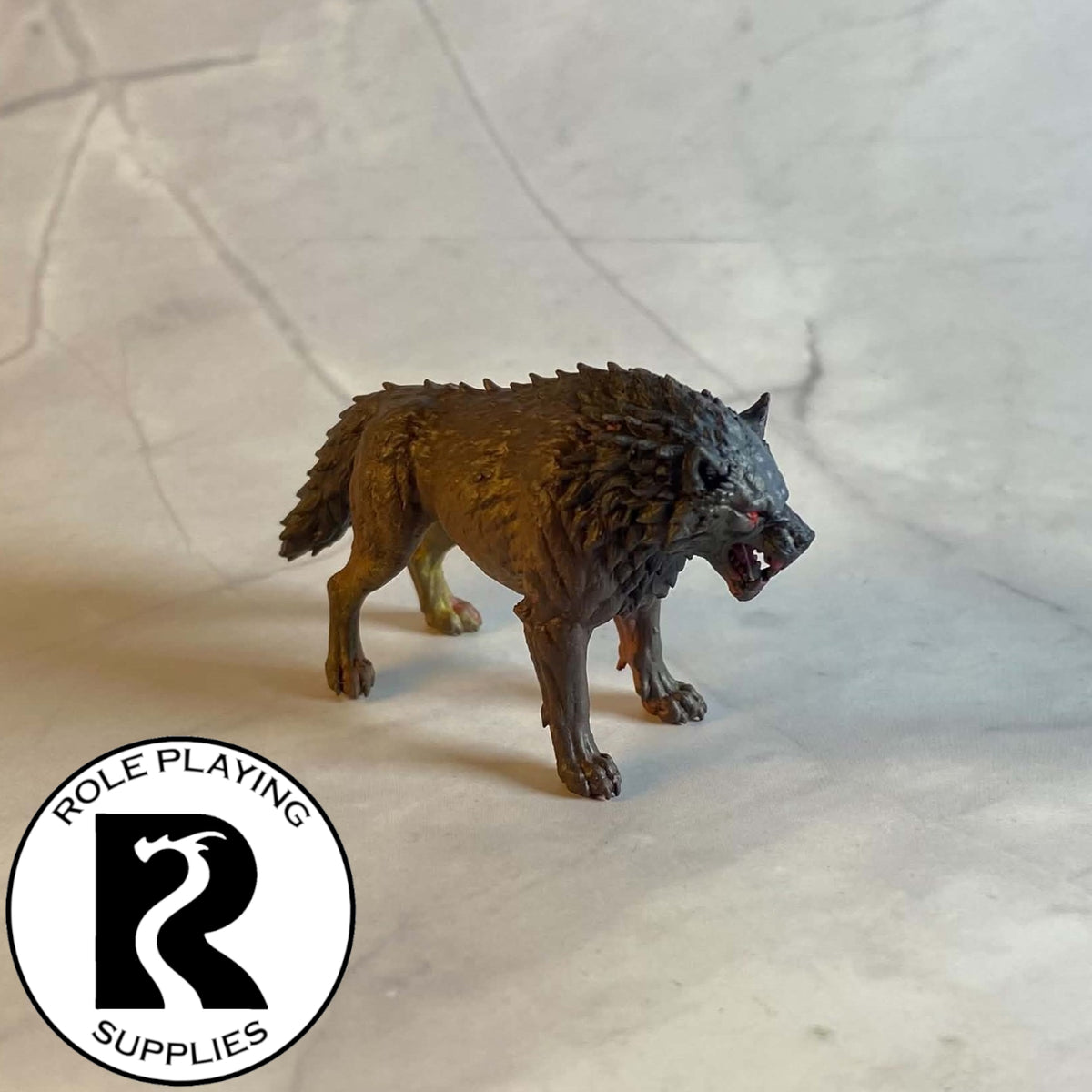 A dnd miniature dire wolf painted.