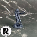 A dnd miniature dryad primed in black.
