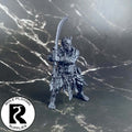 A dnd miniature efreeti primed in black.

