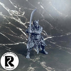 A dnd miniature efreeti primed in black.
