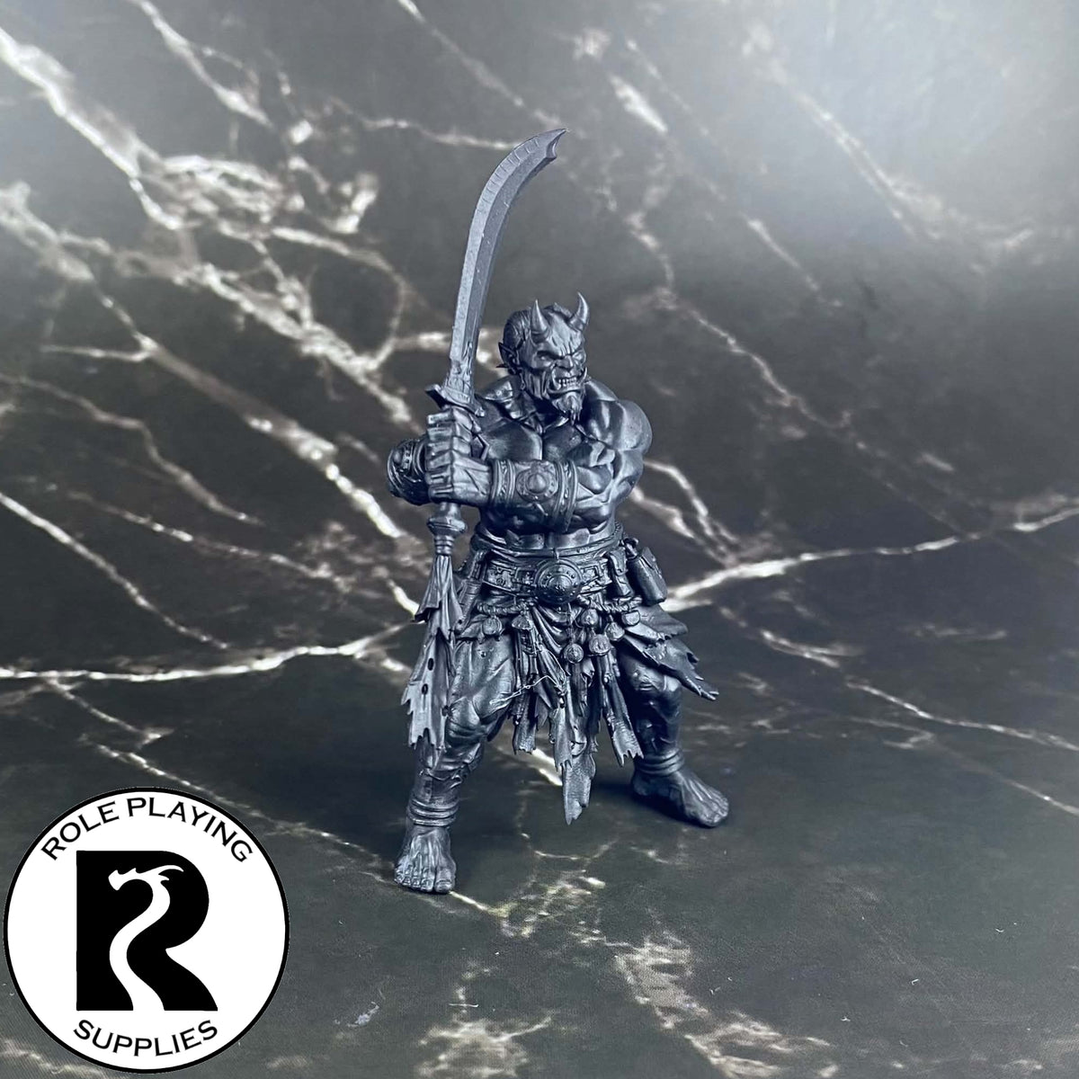 A dnd miniature efreeti primed in black.
