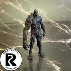 A dnd miniature flesh golem primed in black.