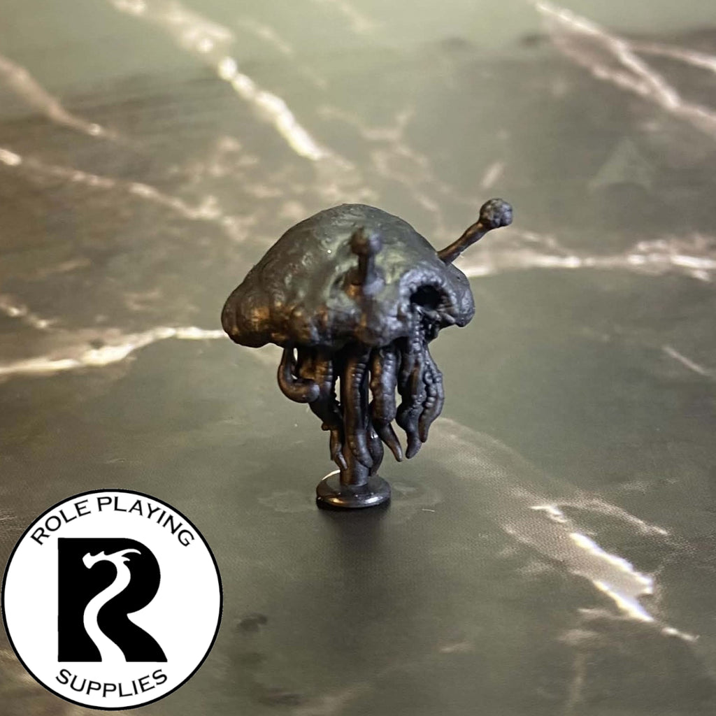 A dnd miniature flumph primed in black.
