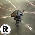 A dnd miniature flumph primed in black.