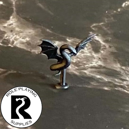 A dnd miniature flying snake primed in black.
