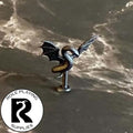 A dnd miniature flying snake primed in black.
