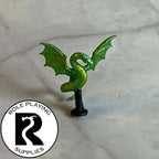 A dnd miniature flying snake painted.