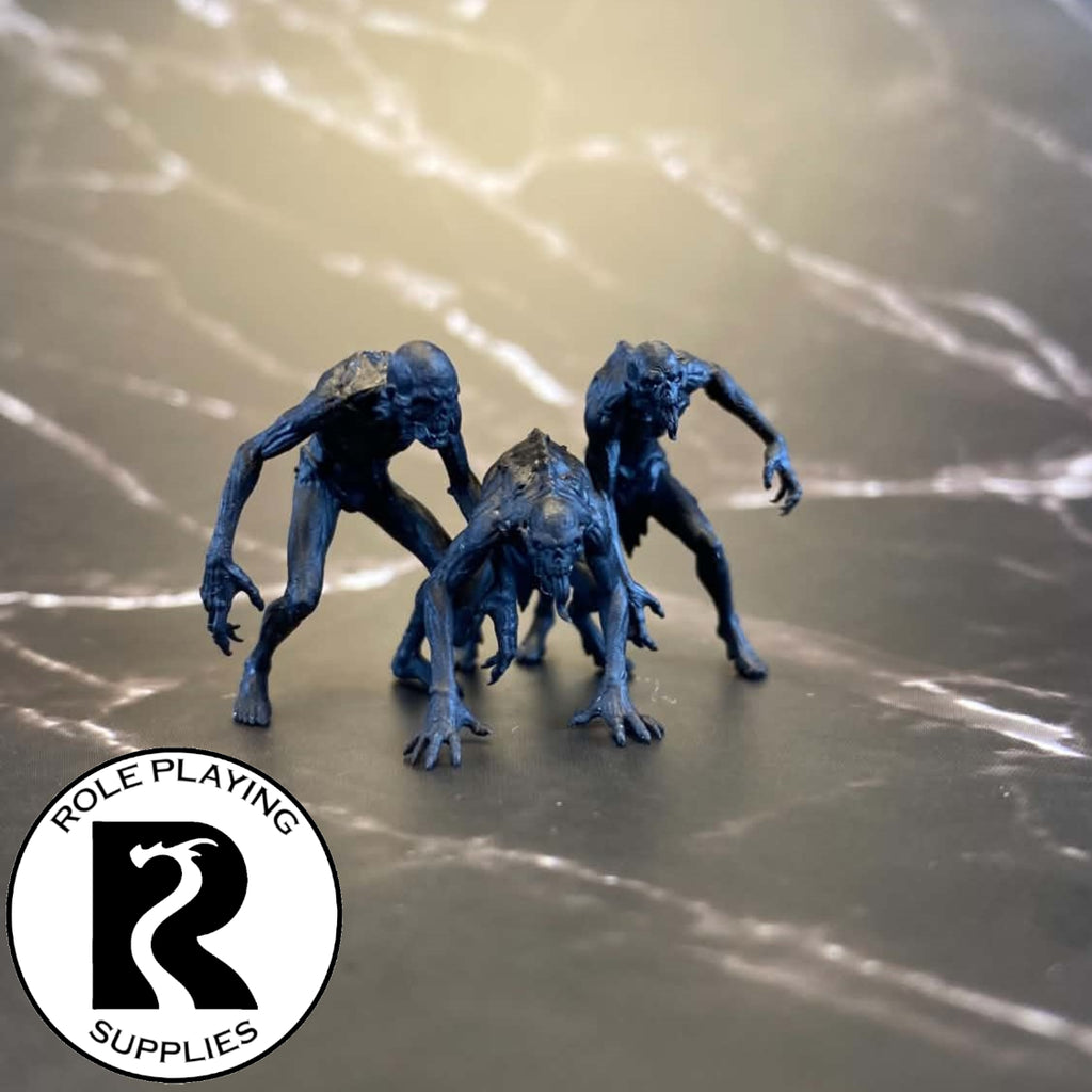 A dnd miniature ghoul primed in black.
