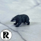 A dnd miniature giant badger painted.
