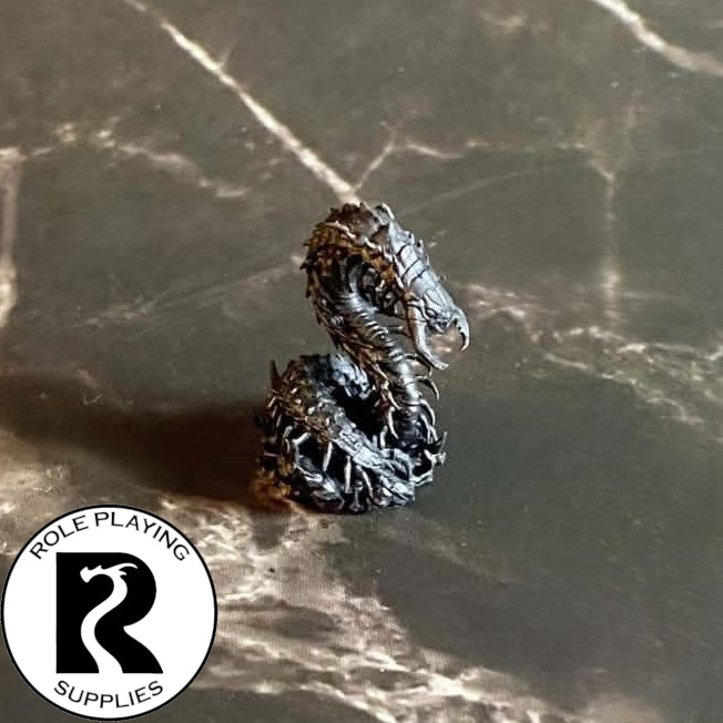 A dnd miniature giant centipede primed in black.