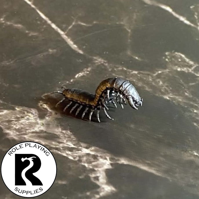 A dnd miniature giant centipede primed in black.
