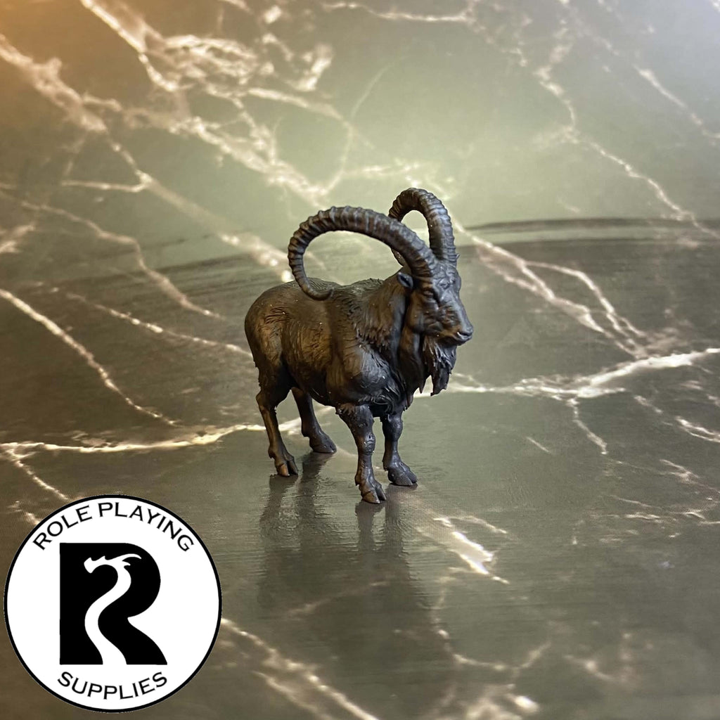 A dnd miniature giant goat primed in black.