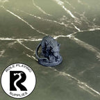A dnd miniature giant rat primed in black.
