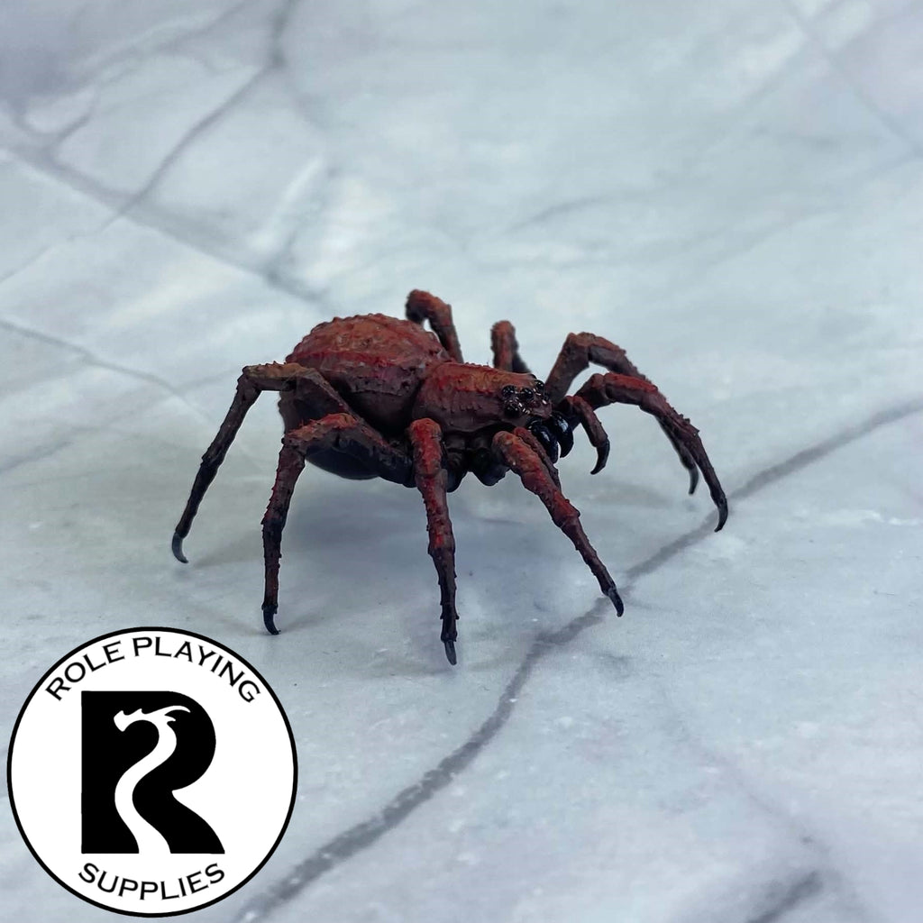 A dnd miniature giant spider painted.
