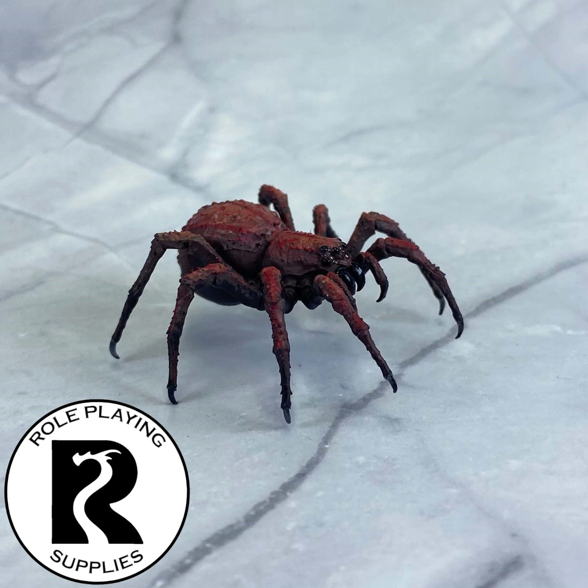 A dnd miniature giant spider painted.
