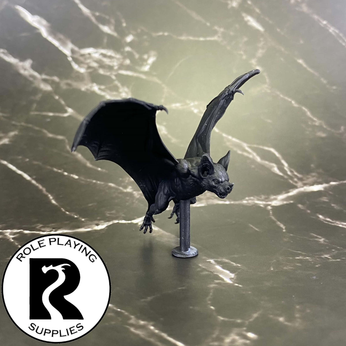 A dnd miniature giant bat primed in black.
