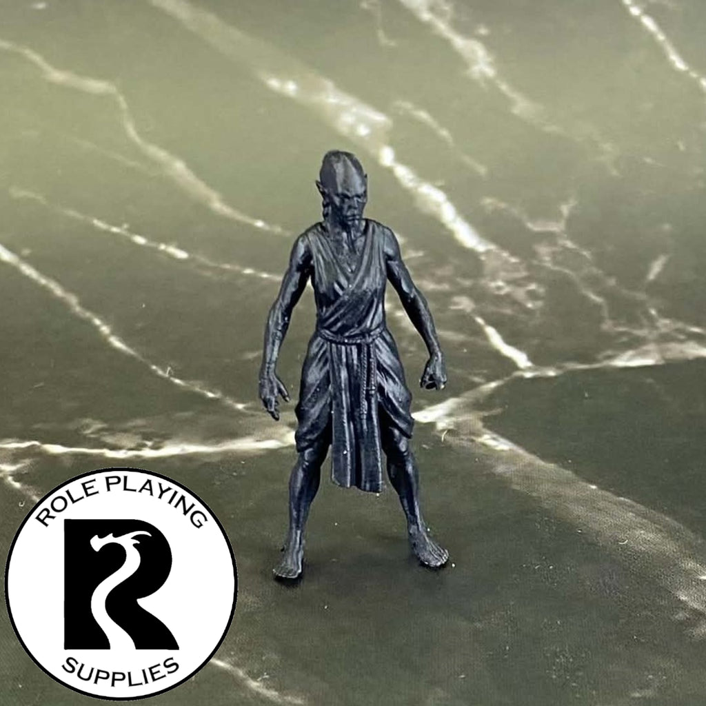 A dnd miniature githzerai monk primed in black.
