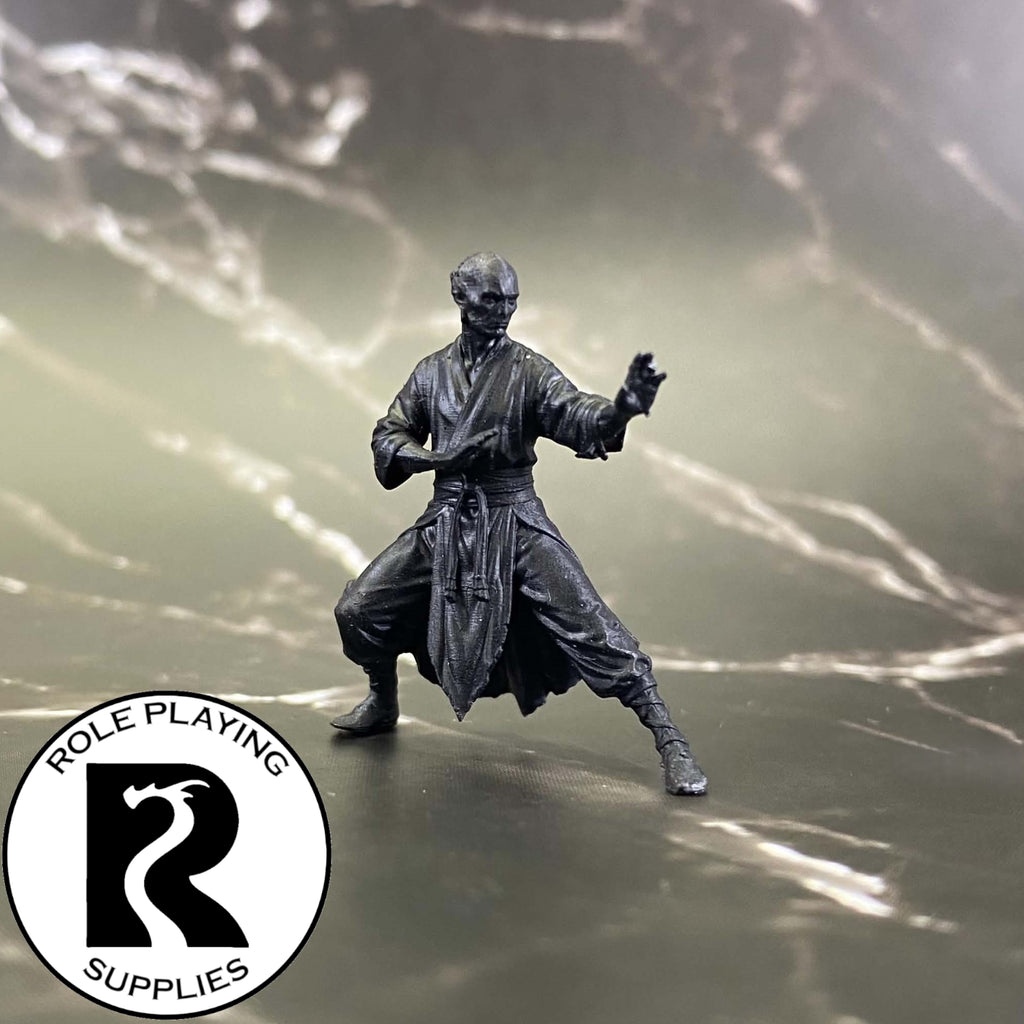 A dnd miniature githzerai zerth primed in black.
