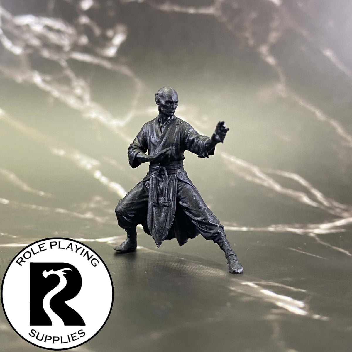 A dnd miniature githzerai zerth primed in black.

