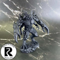 A dnd miniature glabrezu primed in black.
