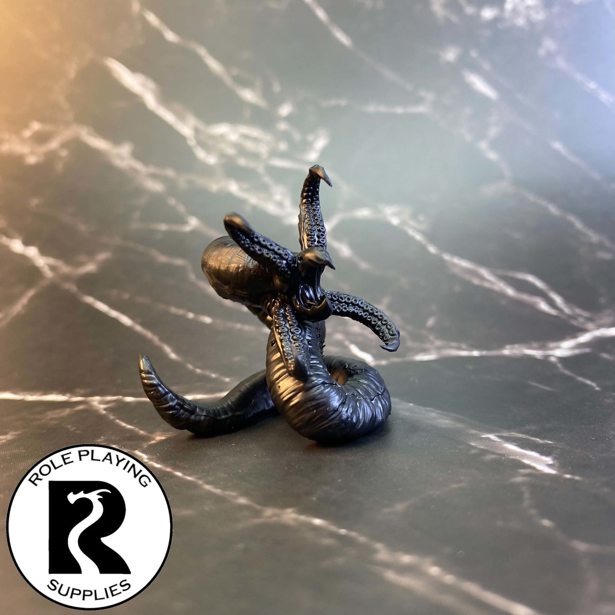 A dnd miniature grick alpha primed in black.
