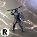 A dnd miniature guard primed in black.
