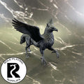 A dnd miniature hippogriff primed in black.
