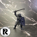 A dnd miniature hobgoblin primed in black.
