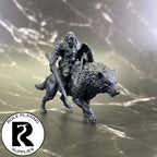 A dnd miniature hobgoblin cavalry (worg) primed in black.
