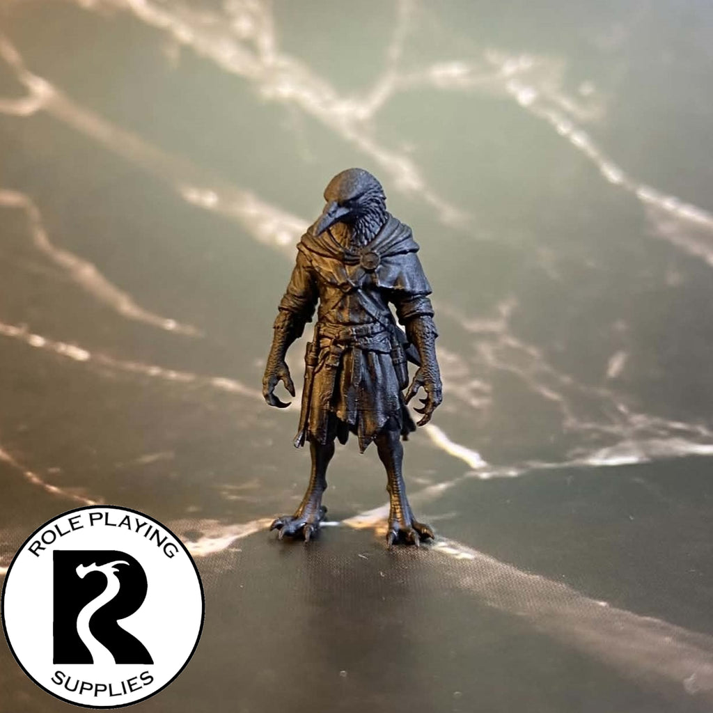 A dnd miniature kenku primed in black.
