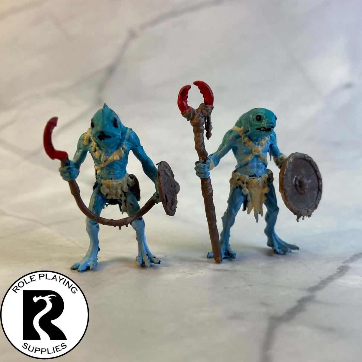A dnd miniature kuo-toa whip painted.
