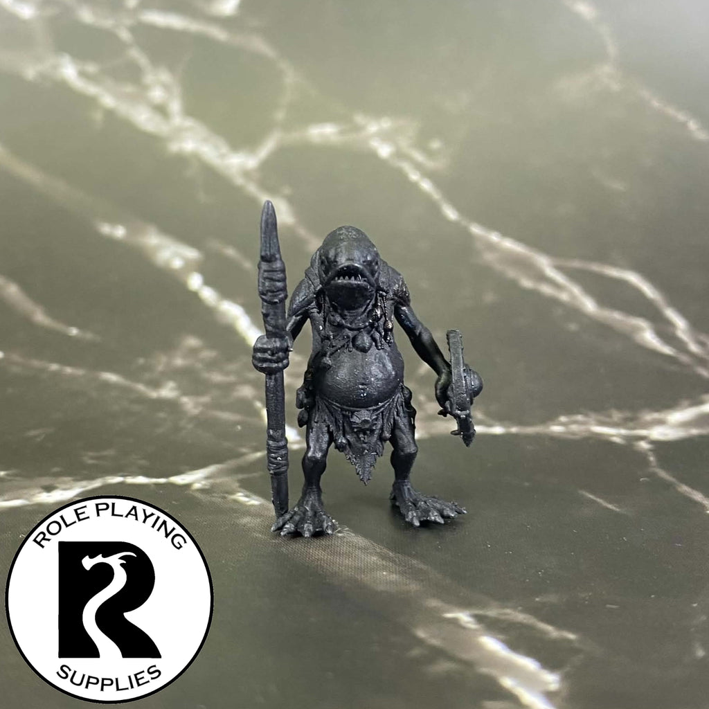 A dnd miniature kuo-toa primed in black.
