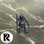A dnd miniature kuo-toa primed in black.
